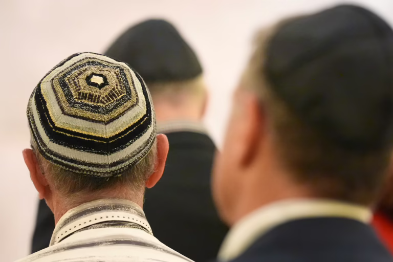 Men wearing kippahs